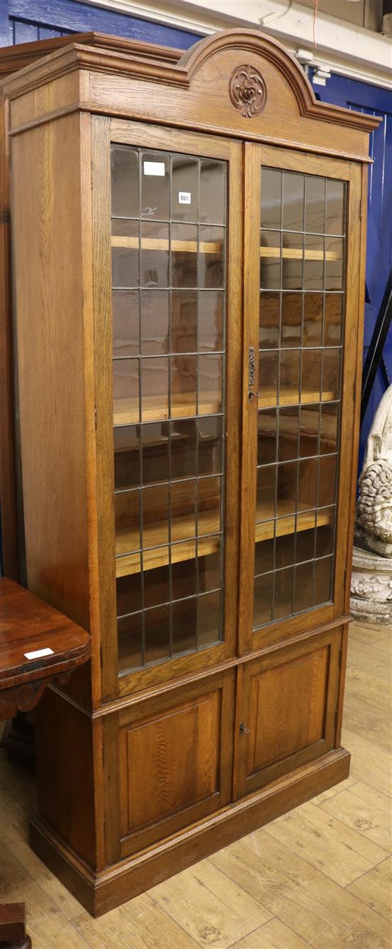 A 1920s oak and leaded glazed bookcase W.90cm